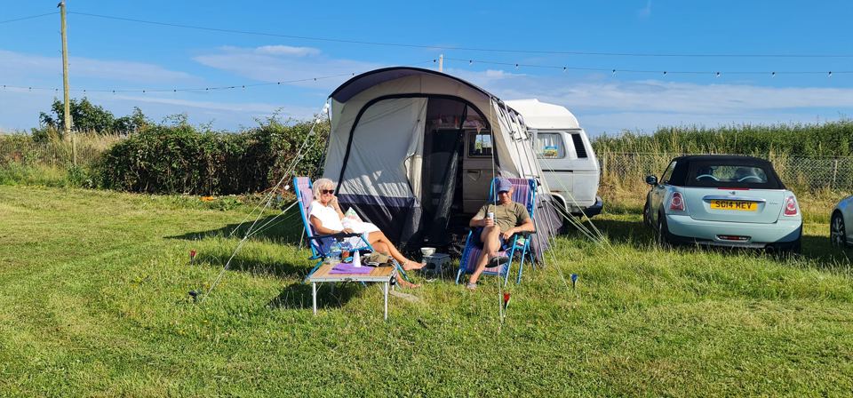 Tent pitch with camping chairs