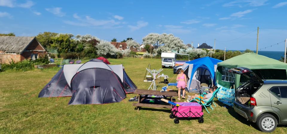 Tents with a glimpse of sea