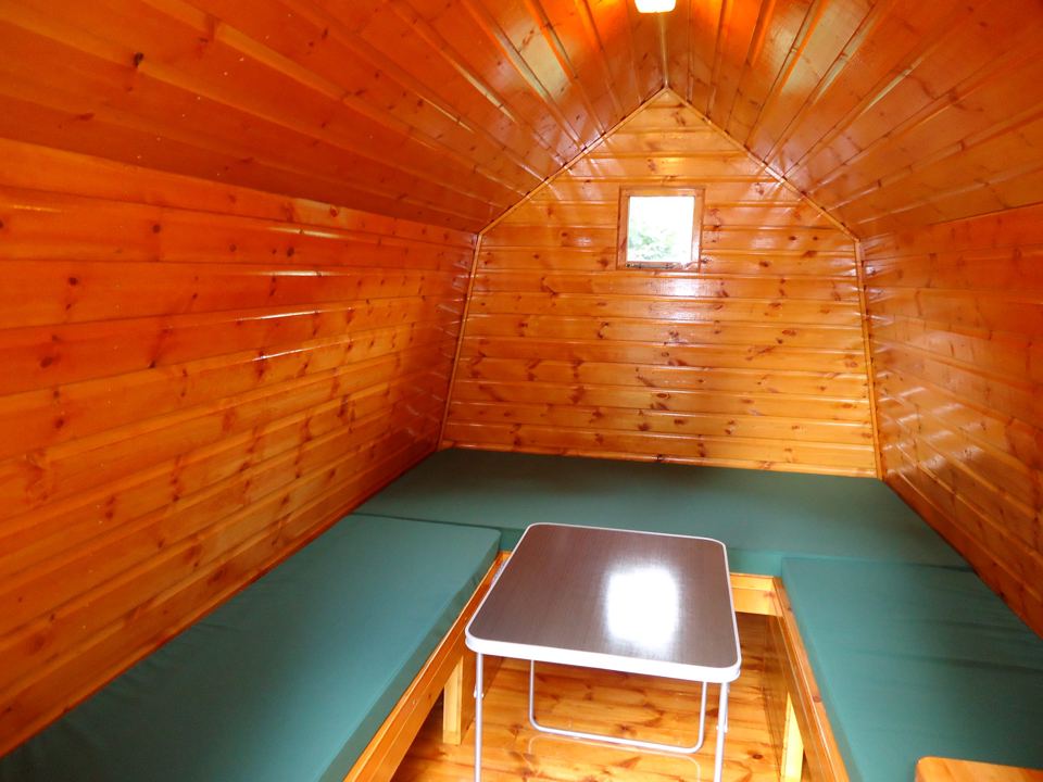 Wooden cabin interior with table