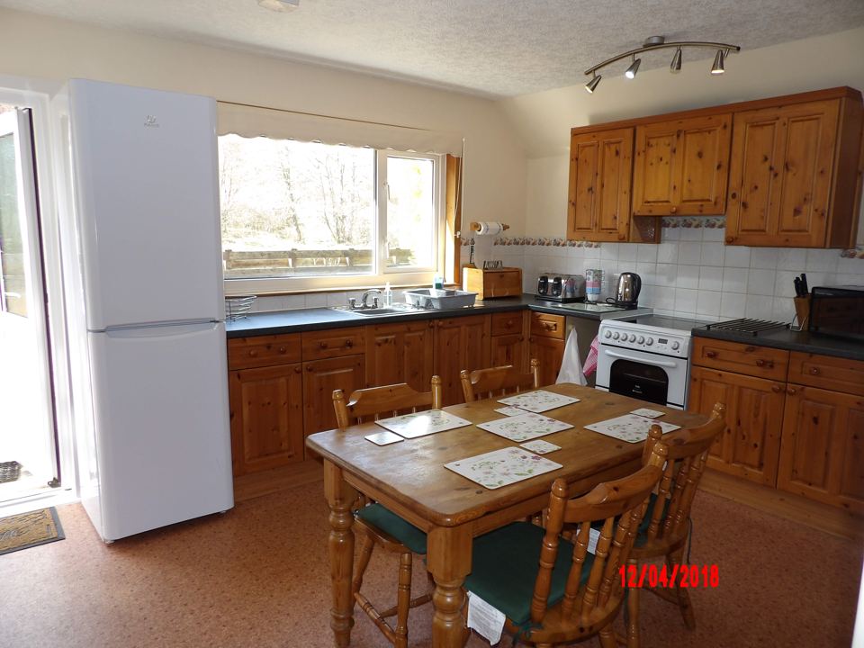 Cottage kitchen and dining area