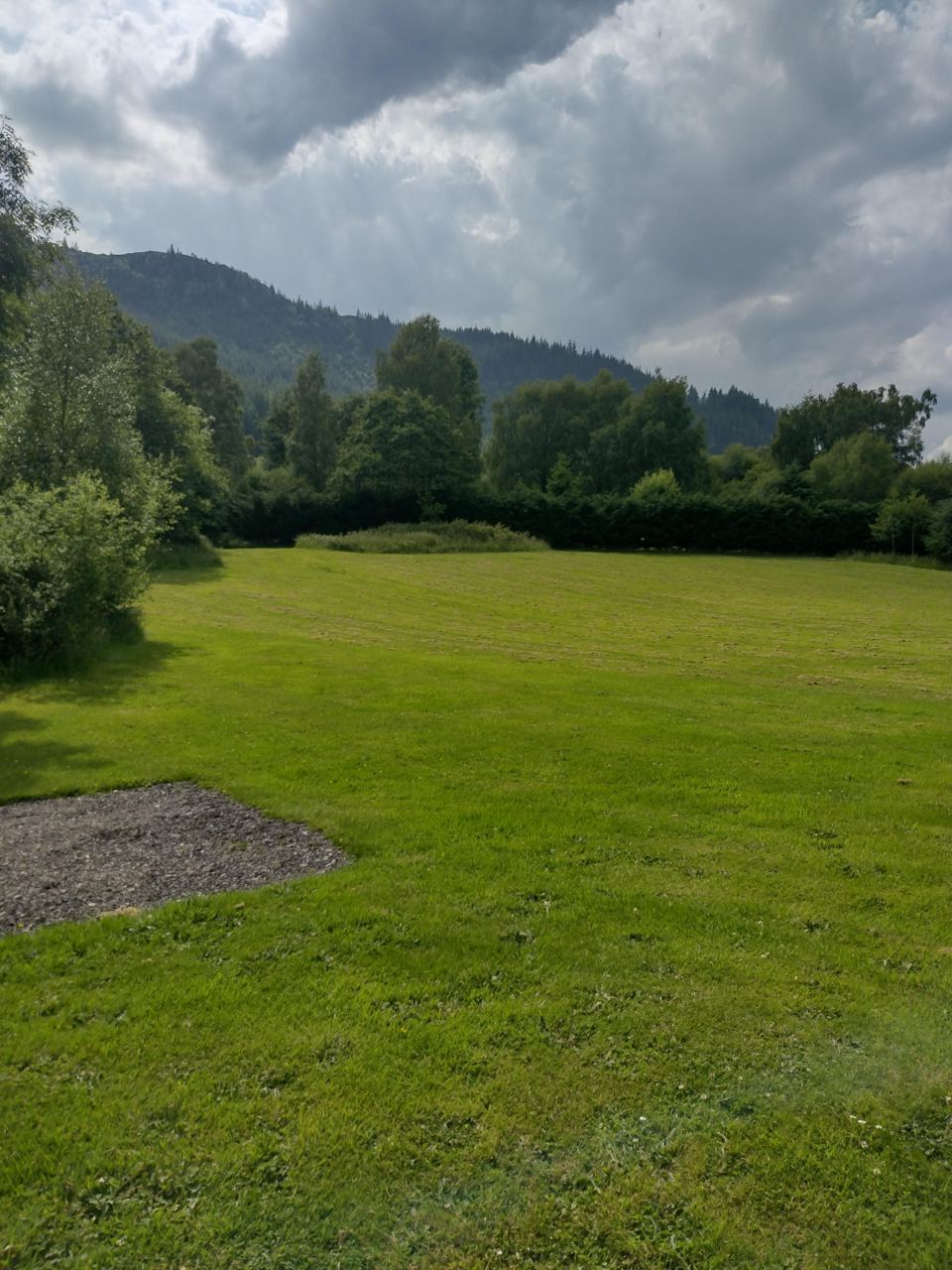 Gravel touring pitch on grass