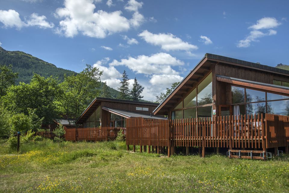 Cabins with mountain backdrop