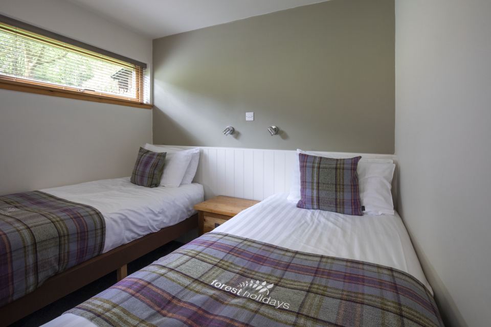 Bedroom with tartan blankets