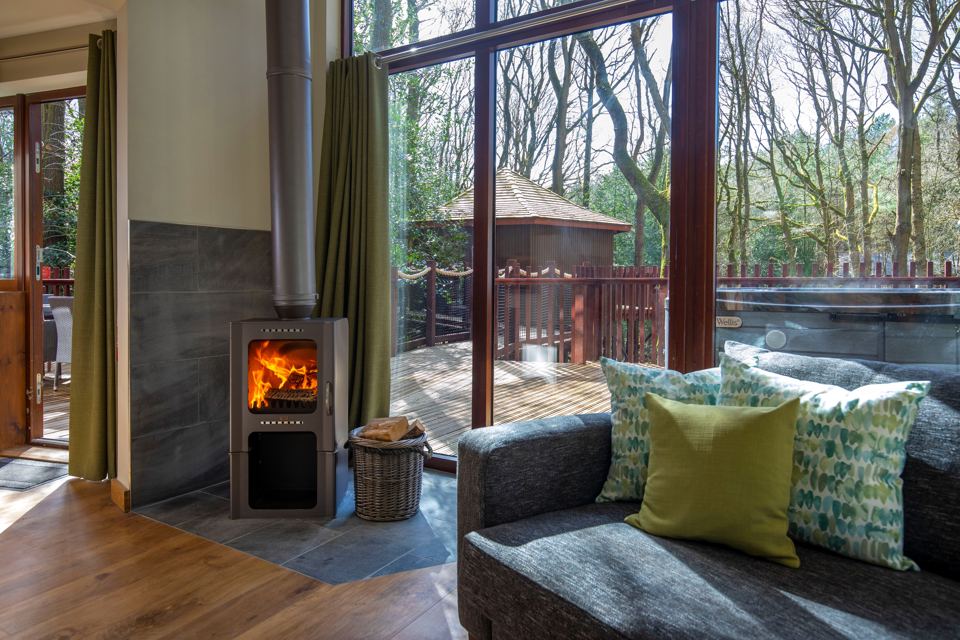 Lounge opening onto forest deck