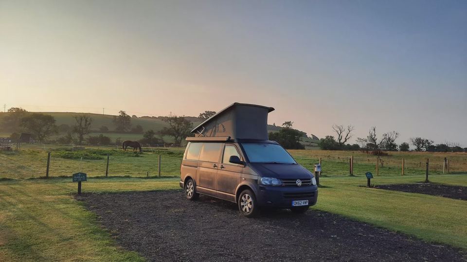 Campervan on a gravel pitch