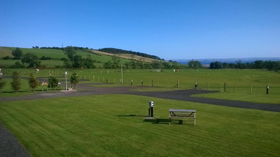 Serviced pitches on mown grass