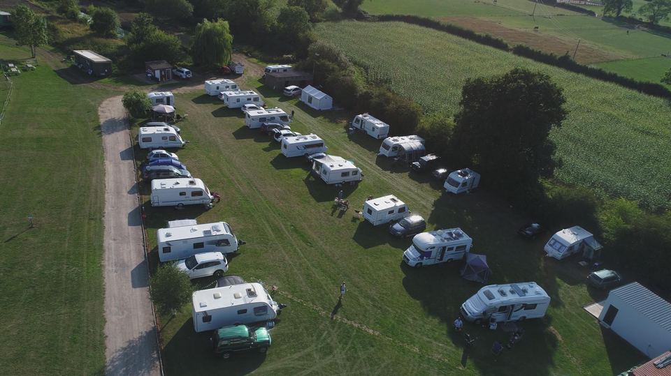 Caravans along the field