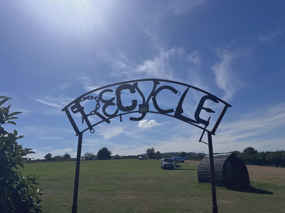 Recycling arch and camping pod