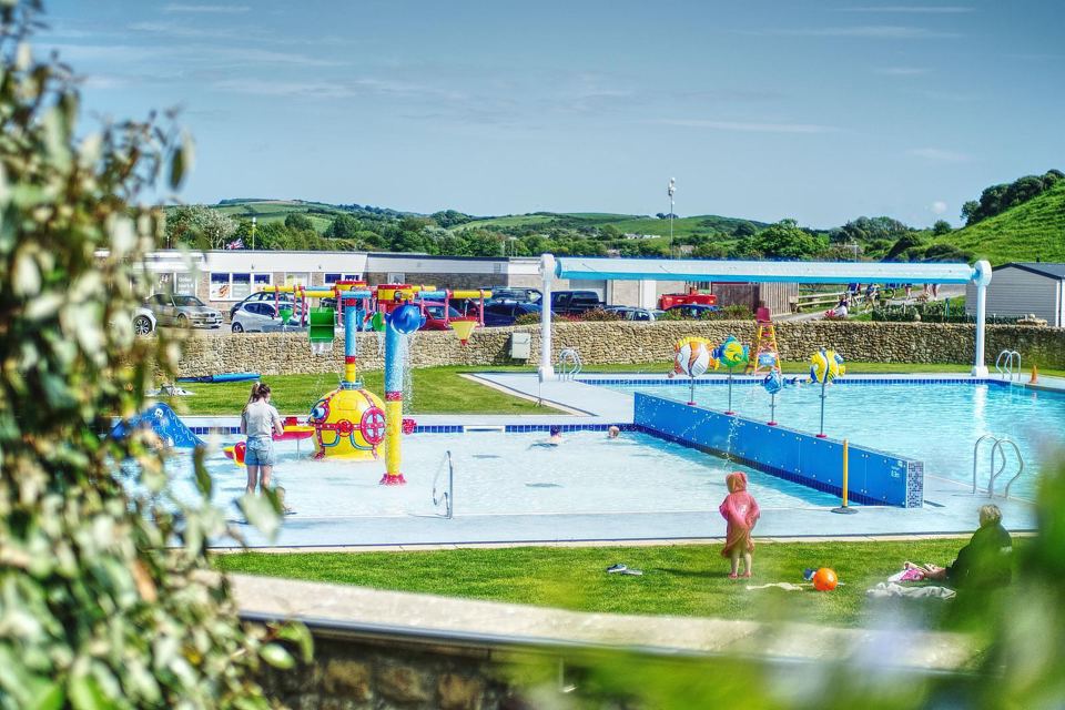 Outdoor splash pool and slides