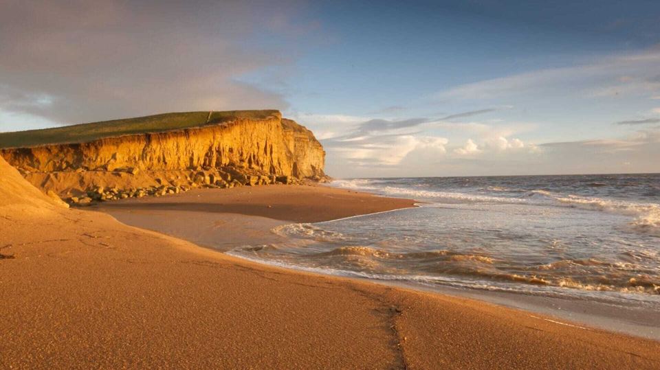 Cliffs and beach at sunset