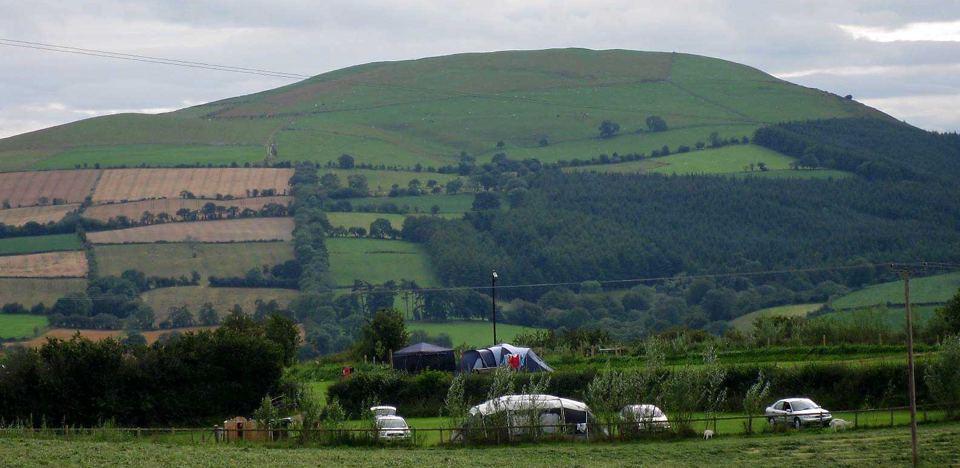 Camping with hills behind