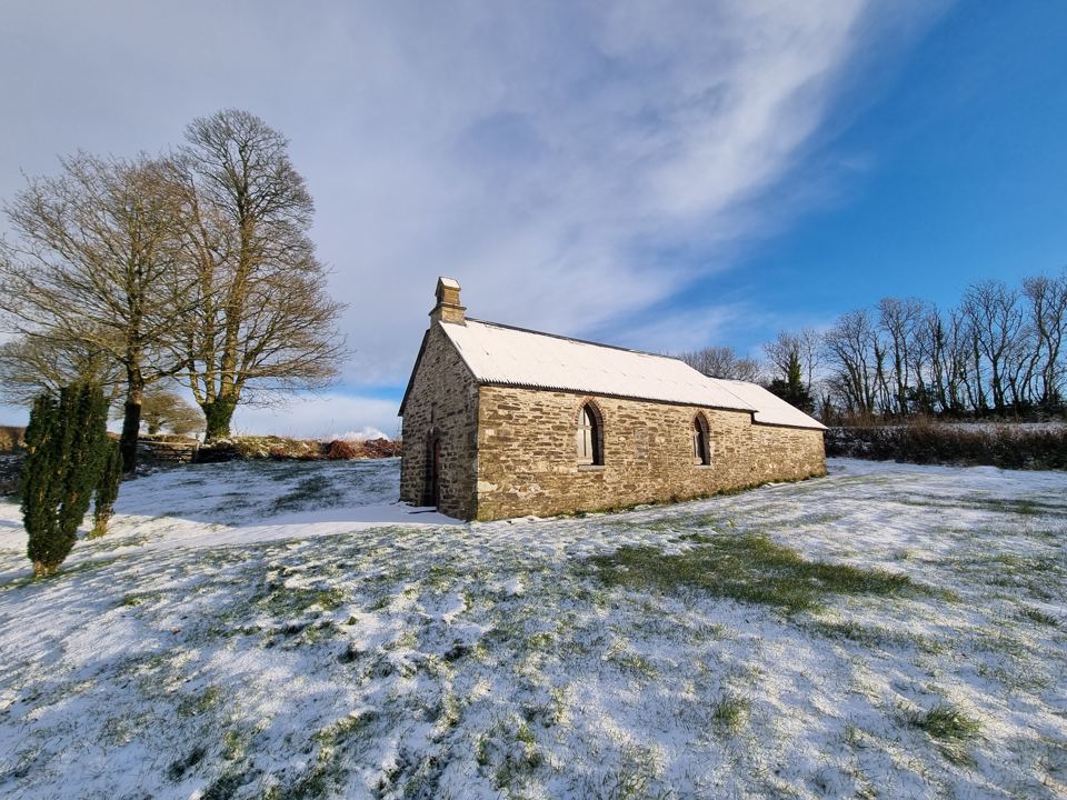 Stone church in the snow