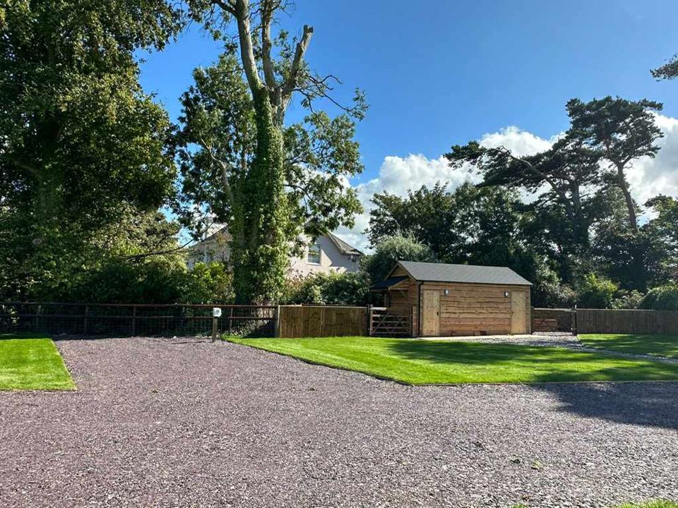 Gravel pitch beside grass