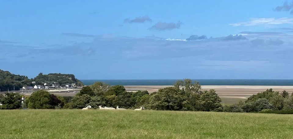 Red Wharf Bay from the field