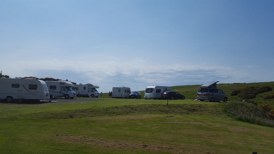 Grass touring pitches by the sea