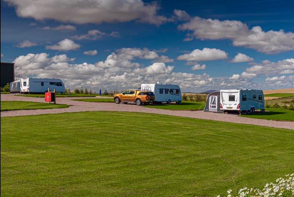 Caravans beside the lawn