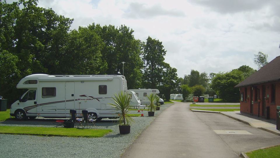 Hardstanding pitches by the hedge