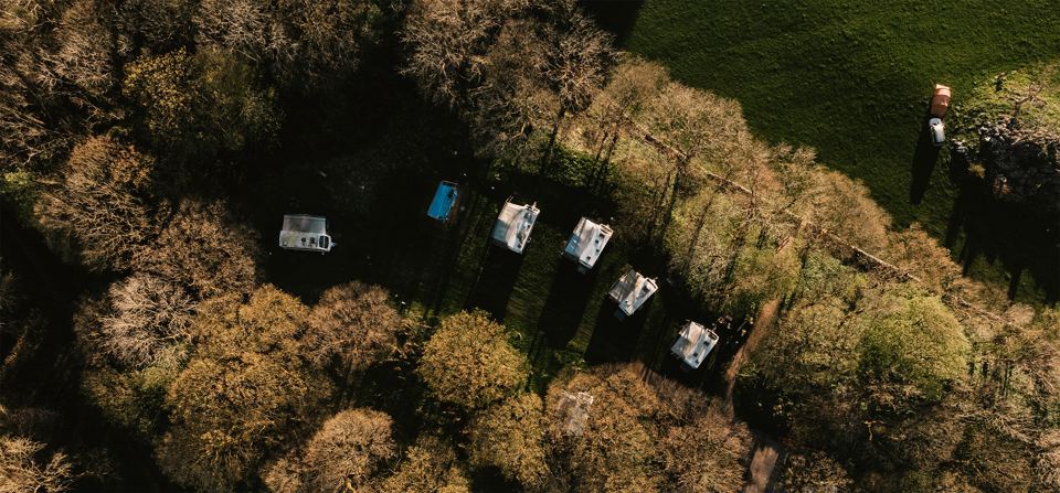 Caravans in the trees from above