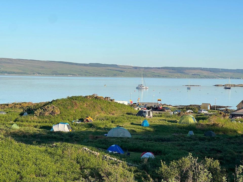 Tents in the tent field above the bay