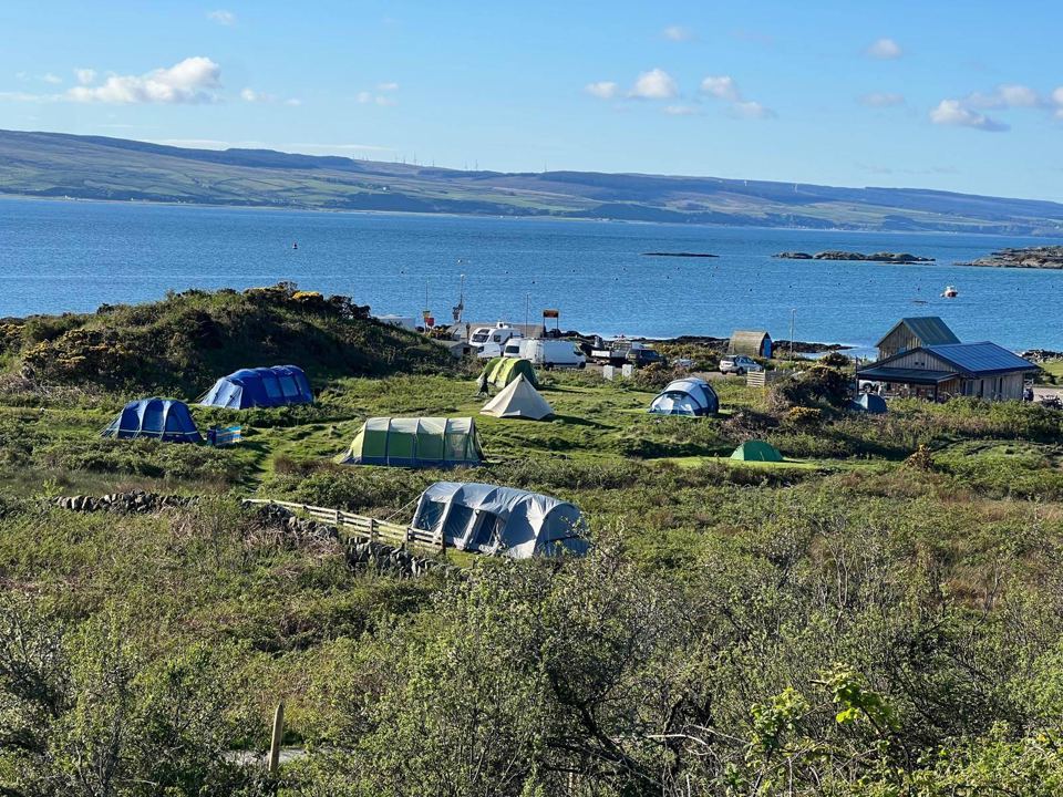 Tent field looking over the water
