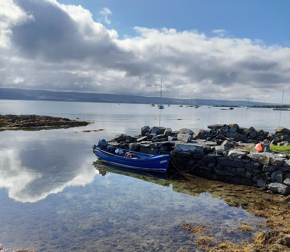 Boat in the bay at low tide