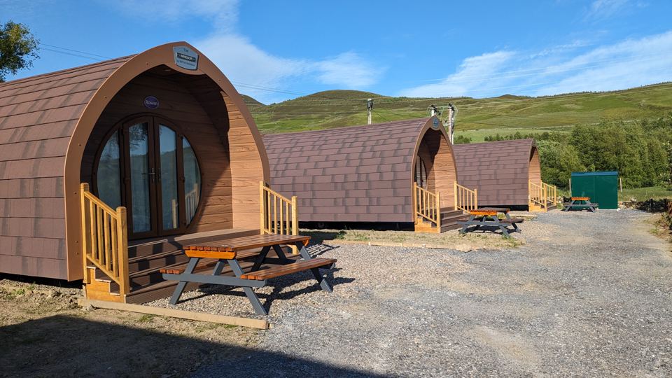 Row of glamping pods