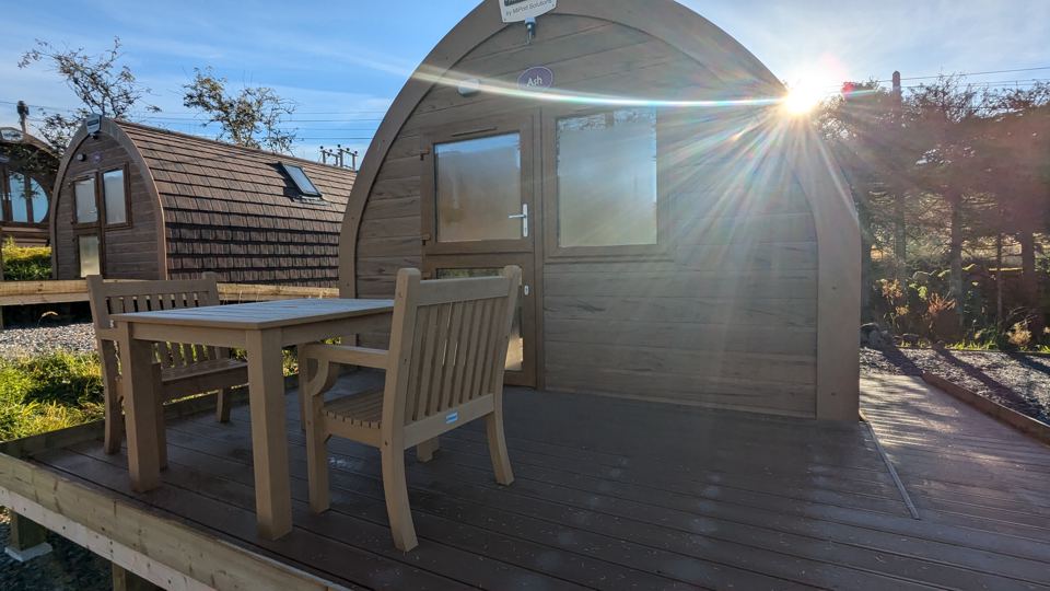 Pod with decking and table