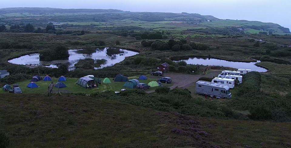 Tents and tourers by the ponds