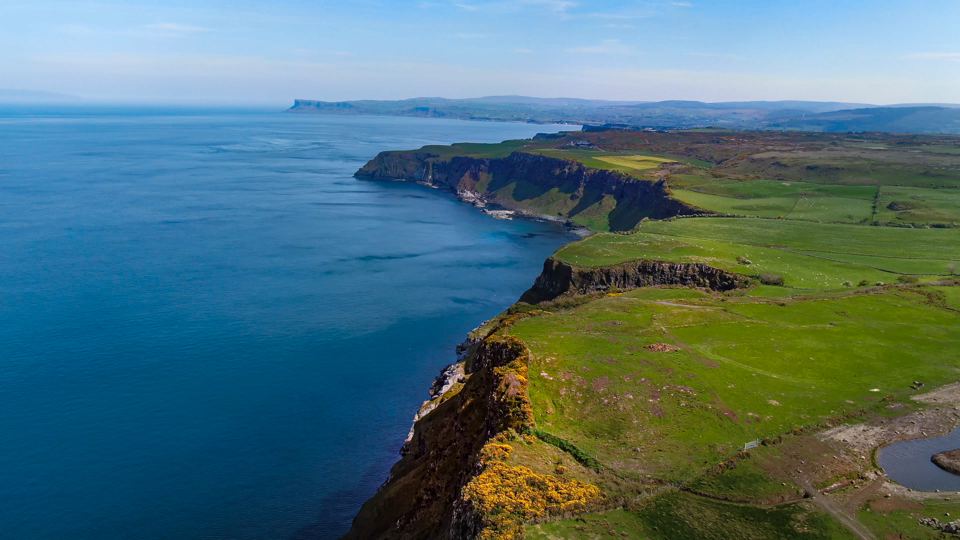 Coast cliffs from the site