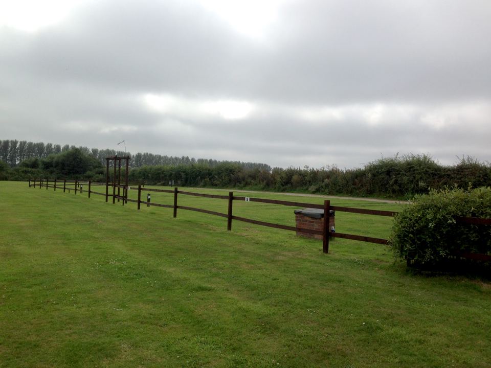 Open grass behind the pub