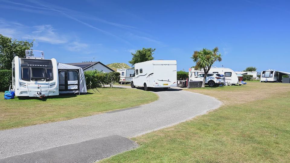 Caravans on paved road pitches