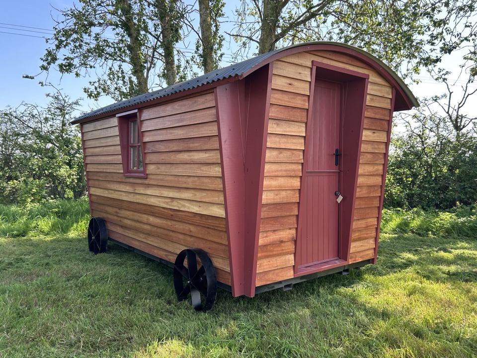 Shepherd's hut with red door