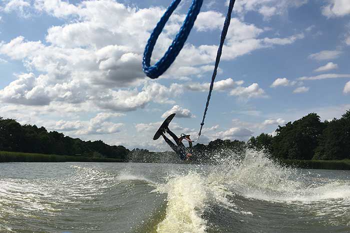 Water-skier behind the boat