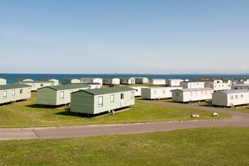 Rows of caravans by the sea