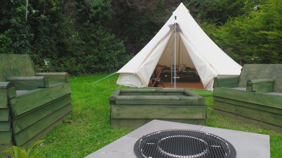 Bell tent with fire pit and seating