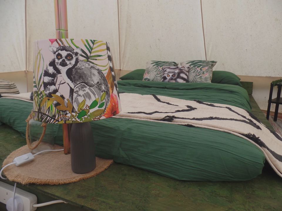 Bedding inside a bell tent