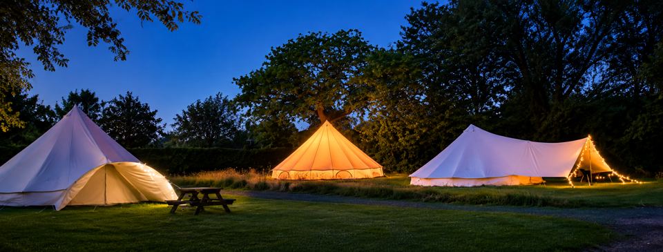 Bell tents at dusk