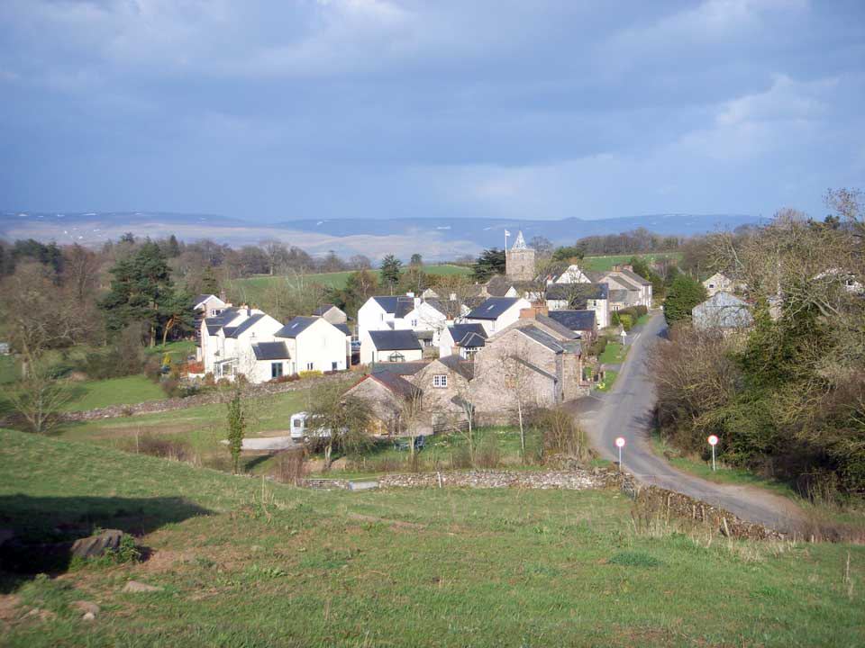 Village and hills across the valley