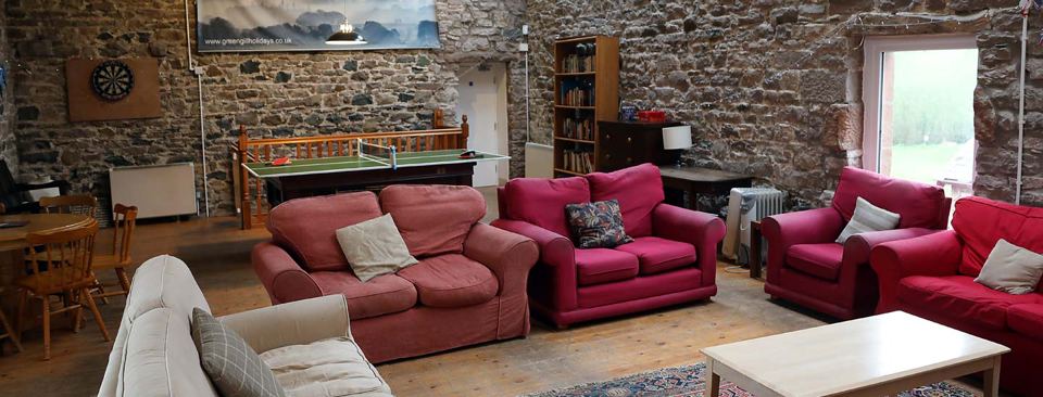 Lounge with sofas and games table