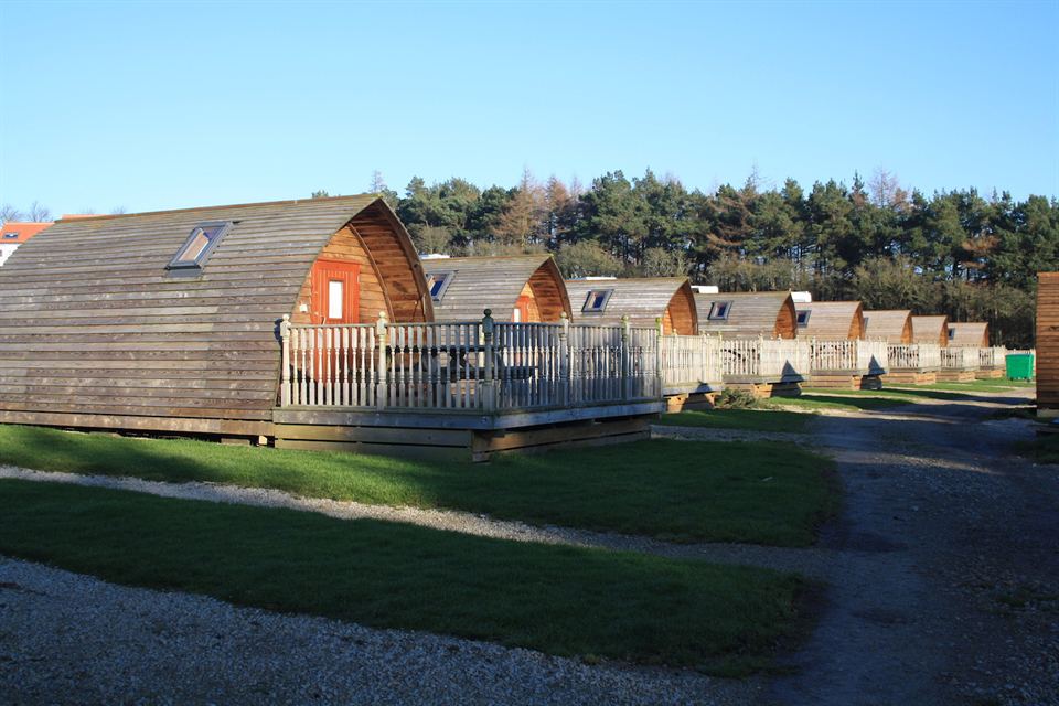 Row of glamping cabins