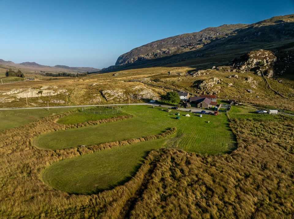 Camping fields below the crags