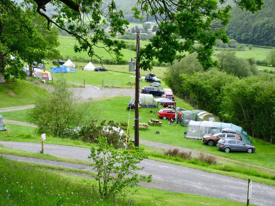 Cars and tents by the track