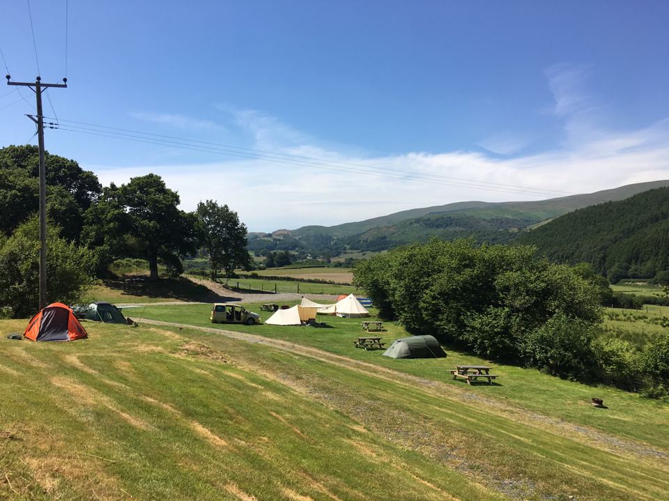 Tent pitches above the valley