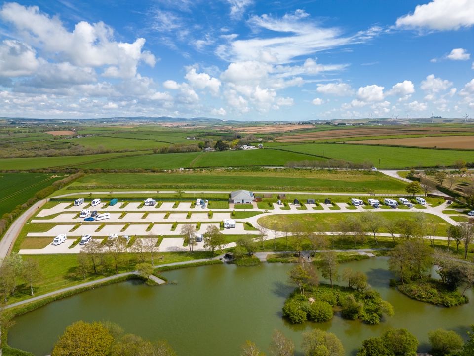 Pitches beside the fishing lake from above