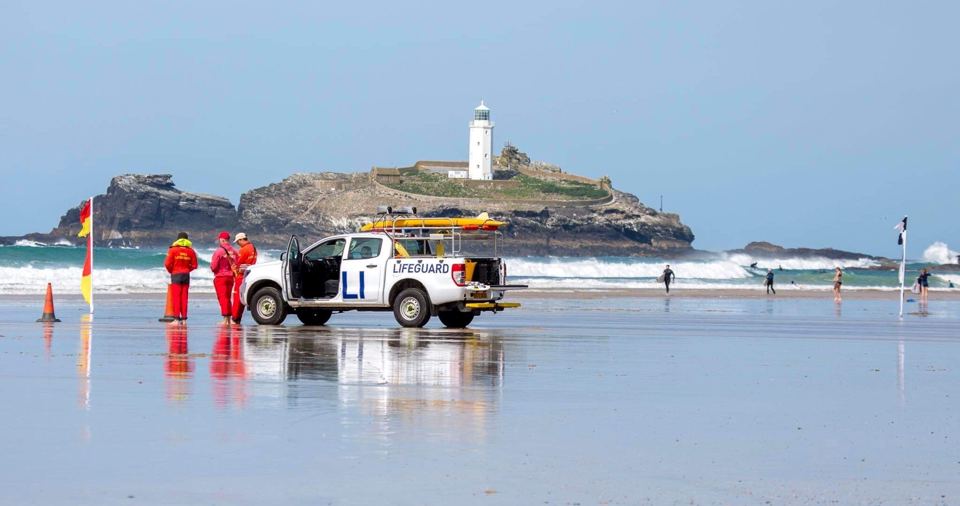 Lifeguard on the beach by the lighthouse
