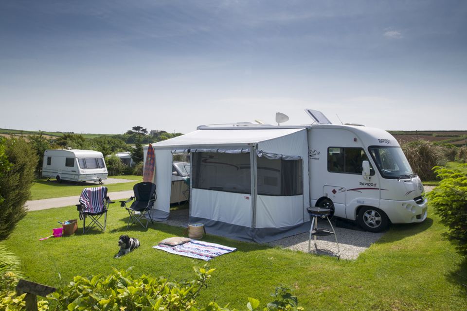 Motorhome with awning on pitch