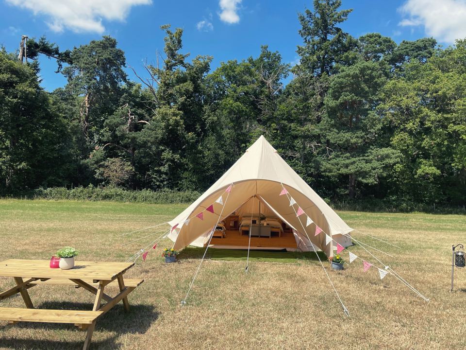 Bell tent with picnic table