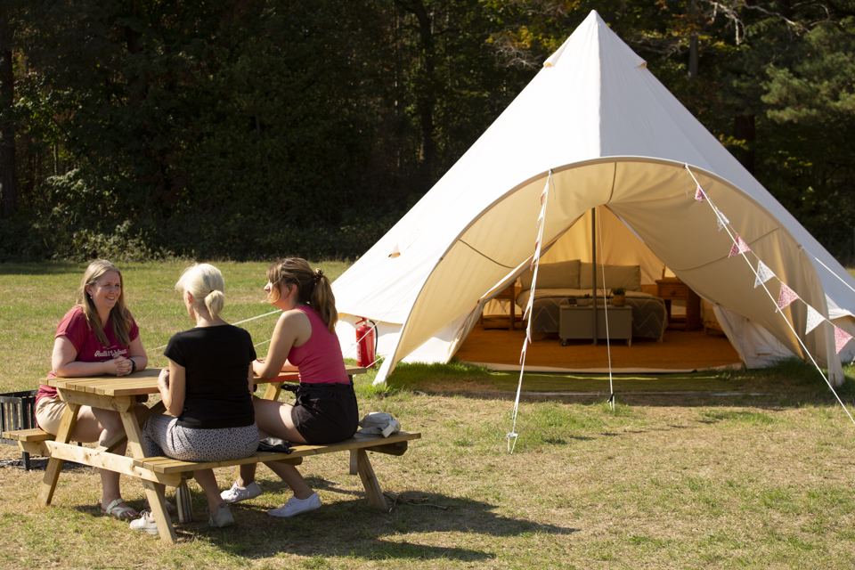 Bell tent and picnic bench