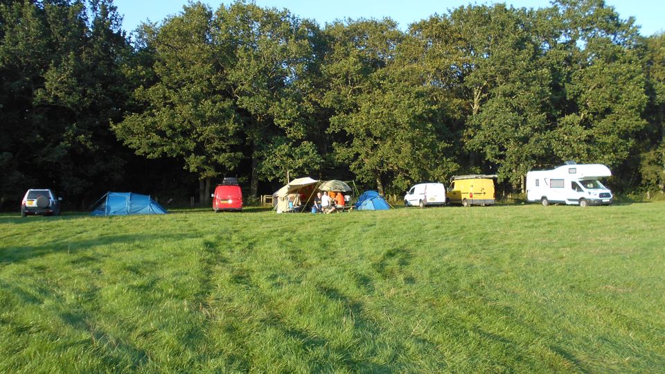 Tents and motorhomes on the field