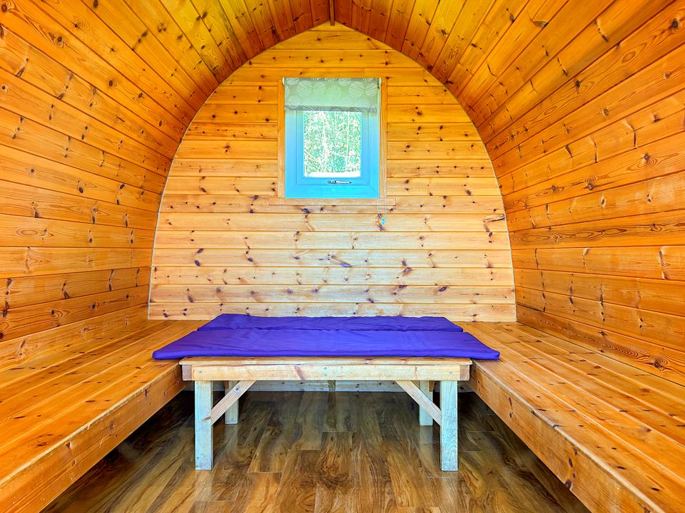 Inside a pod with a bench